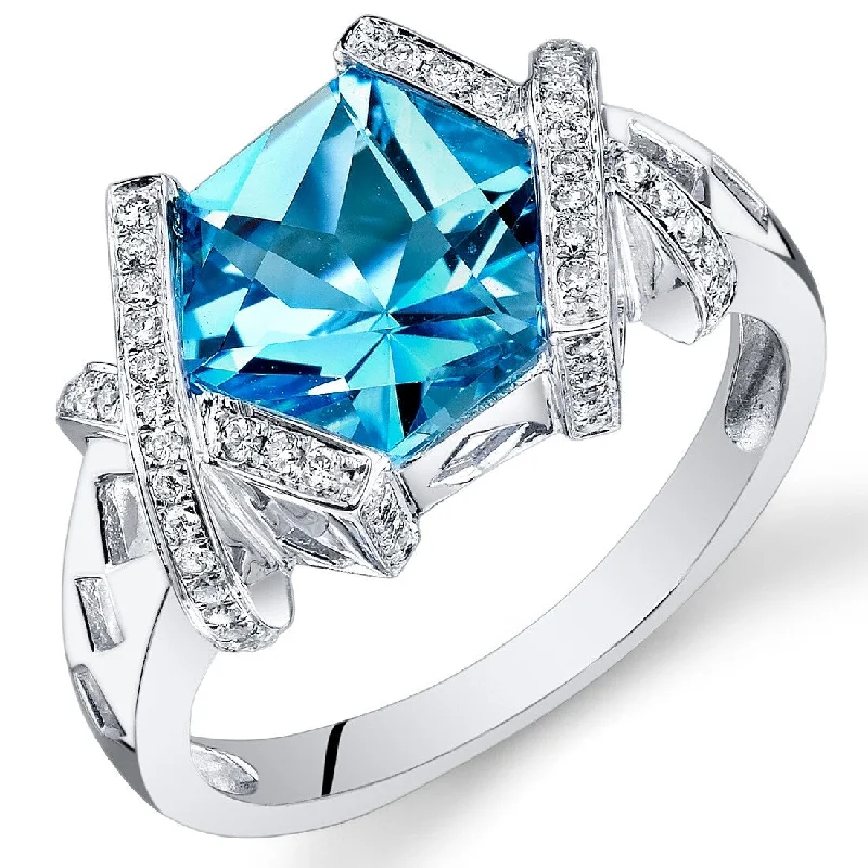 Gold gemstone rings adding bright shine to fingers -14k White Gold 3.1ct Swiss Blue Topaz and Diamond Ring