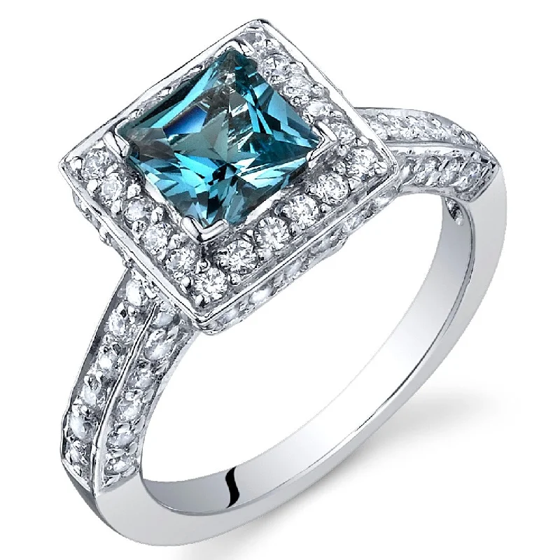 Gemstone rings featuring stretch bands for easy wear -Sterling Silver 1 ct London Blue Topaz Halo Ring