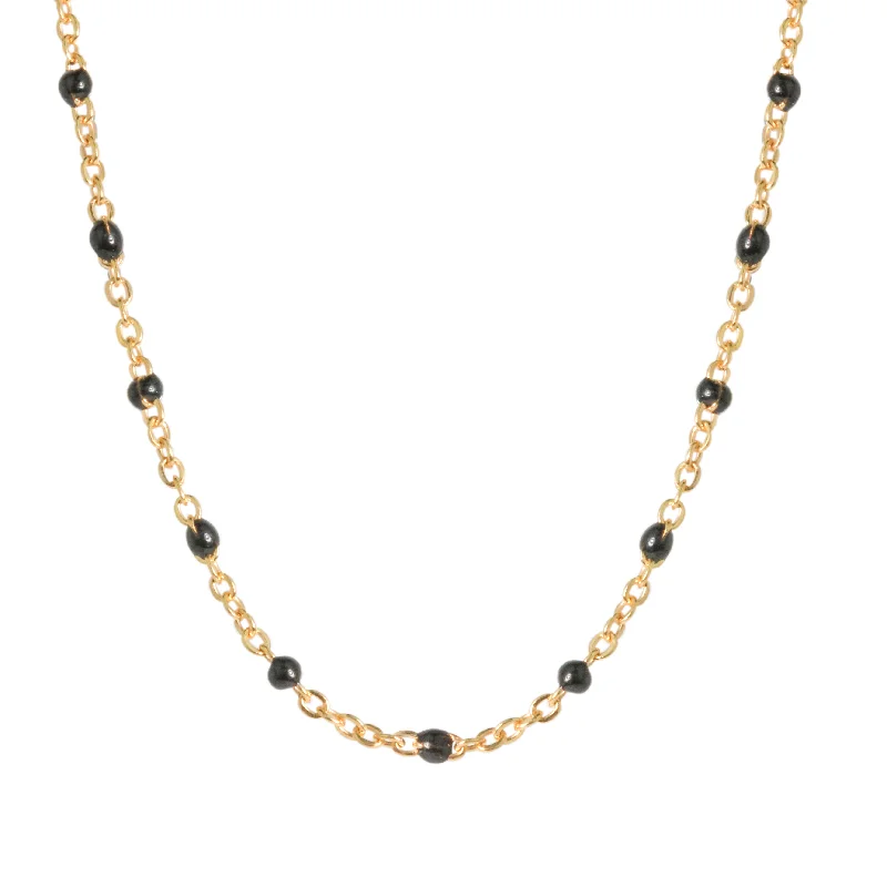 Adjustable pendant necklaces for customizable length and versatile fashion choices -Black Enamel Dot Necklace