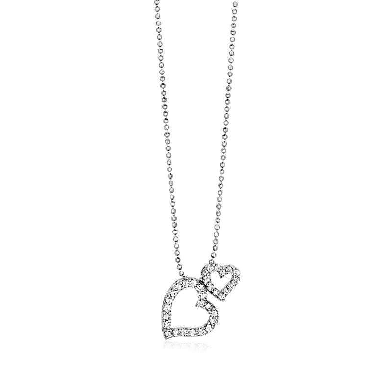 Intricate filigree pendant necklaces for a vintage-inspired and detailed accessory -Size: 18'' - Sterling Silver Necklace with Two Open Hearts and Cubic Zirconias