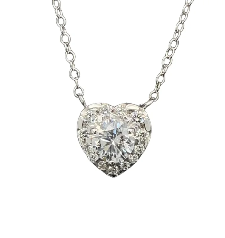 Stunning diamond pendants for necklaces to add sparkle and elegance -14kt white gold diamond heart Necklace set in halo with diamond by the yard chain