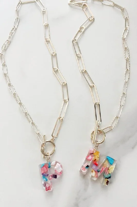 Delicate butterfly pendants on necklaces for a charming and feminine accessory -KN8167 Assorted 16 Piece Rainbow Acrylic Initial Toggle Chain Necklace Pack