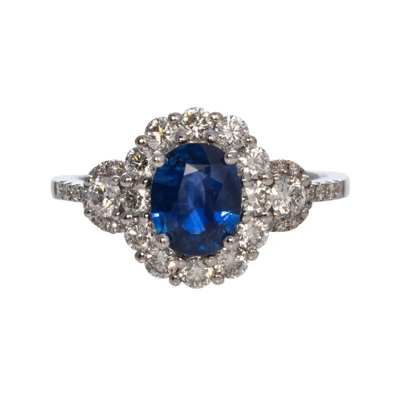 Gemstone rings inspired by vintage stone elegance -1ct Oval Sapphire & .79ctw Diamond Halo 18K White Gold Ring